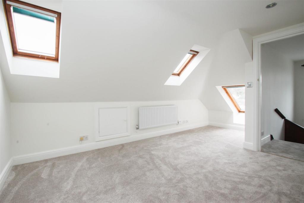 What is a Velux Loft Conversion in Woodford?